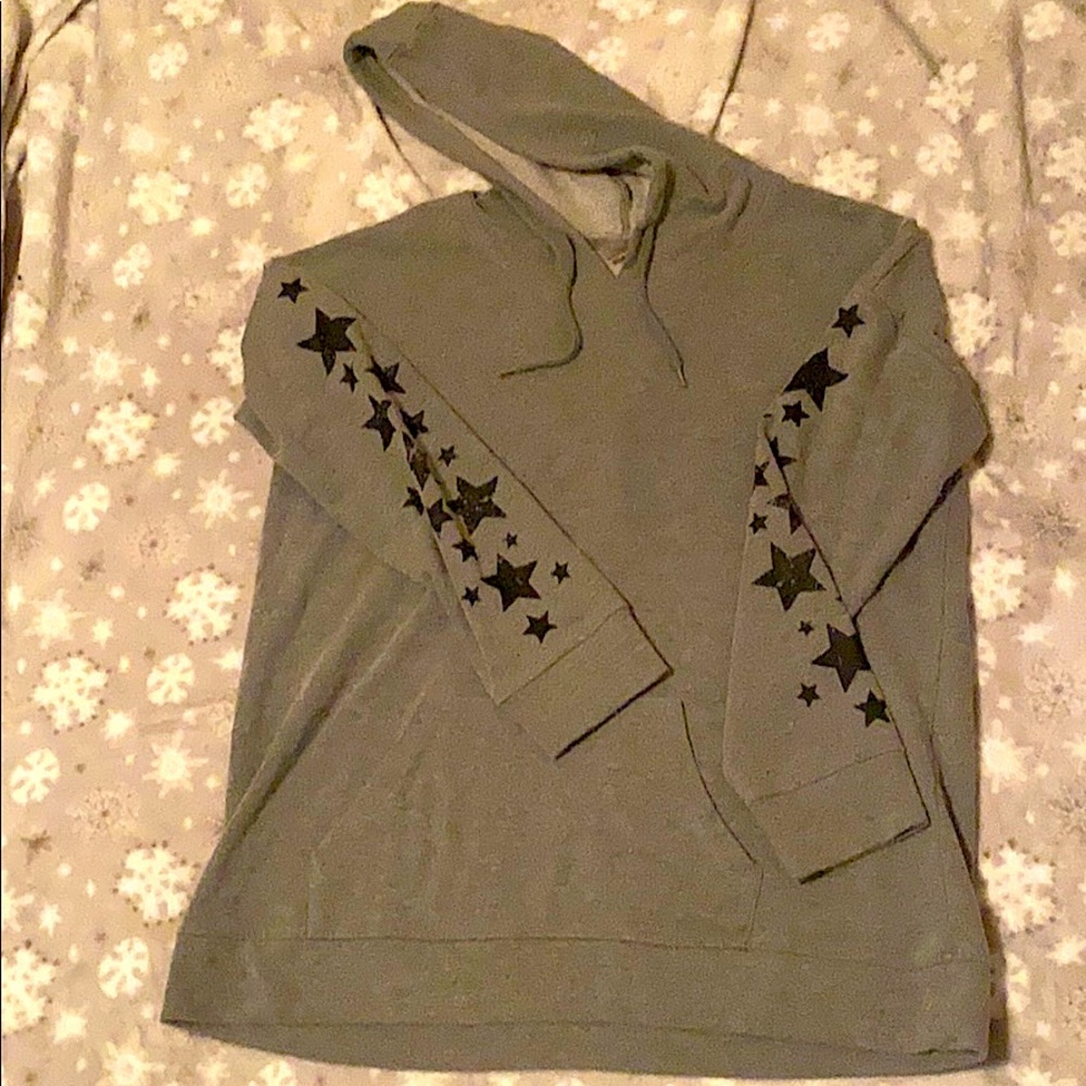 gray large sweatshirt with stars on sleeves
